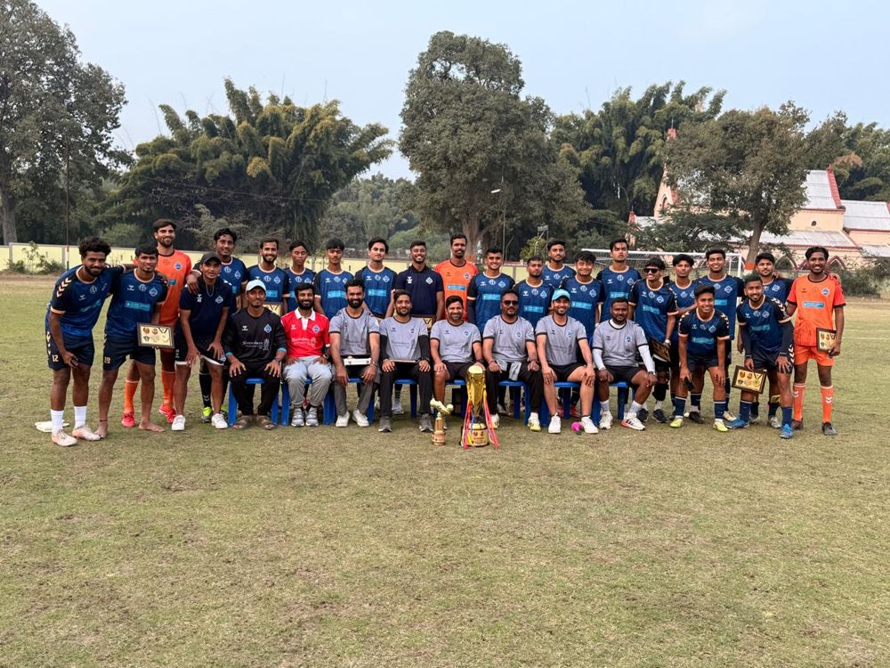 Lakecity FC squad with the trophy